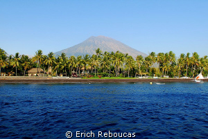 Black sand beach and the Agung volcano, Tulamben, Bali by Erich Reboucas 
